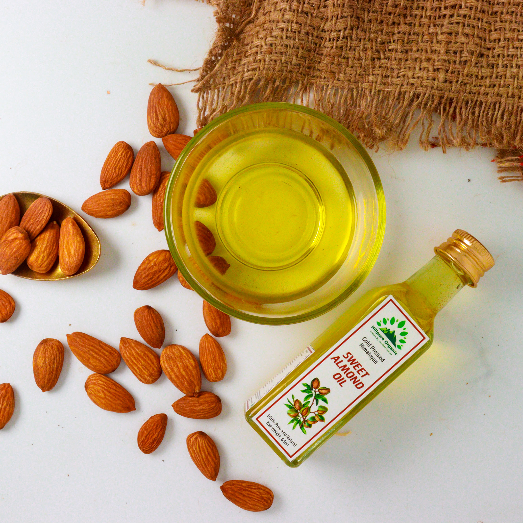 Hillpure Organic Cold Pressed Himalayan Sweet Almond Oil - 100% Pure & Natural Edible Badam Tel Rich in Vitamin -E For Healthy Skin, Hair and Body (65 ml,Pack of 2, Glass Bottle) - Image 4